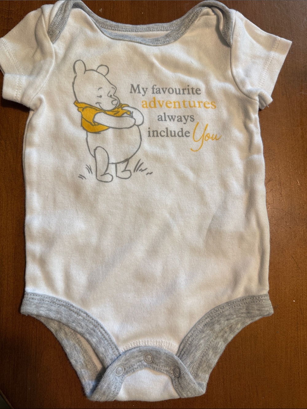 Disney White & Gray Winnie the Pooh Graphic Baby Bodysuit with Yellow Accent